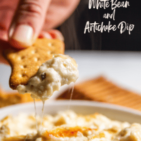White bean and artichoke dip on cracker