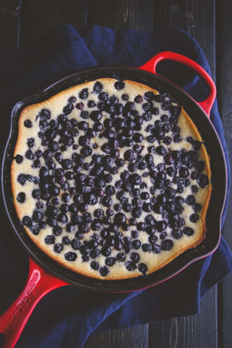 Blueberry skillet dump cake in red pan