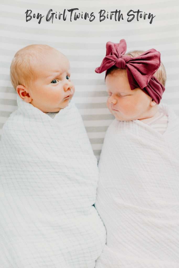 Twin babies swaddled in white on white sheet