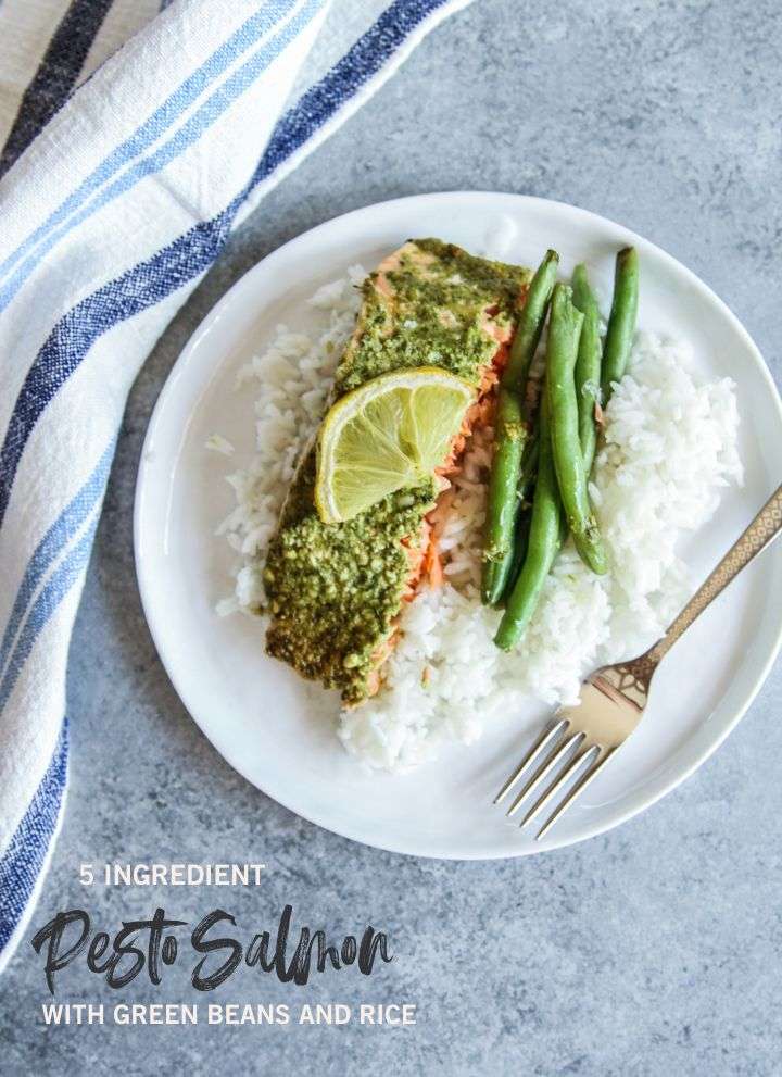 5 ingredient pesto salmon with green beans and rice on a white dinner plate